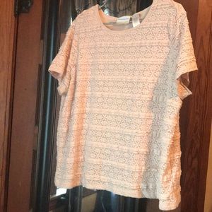 Loose fitting light pink dress shirt